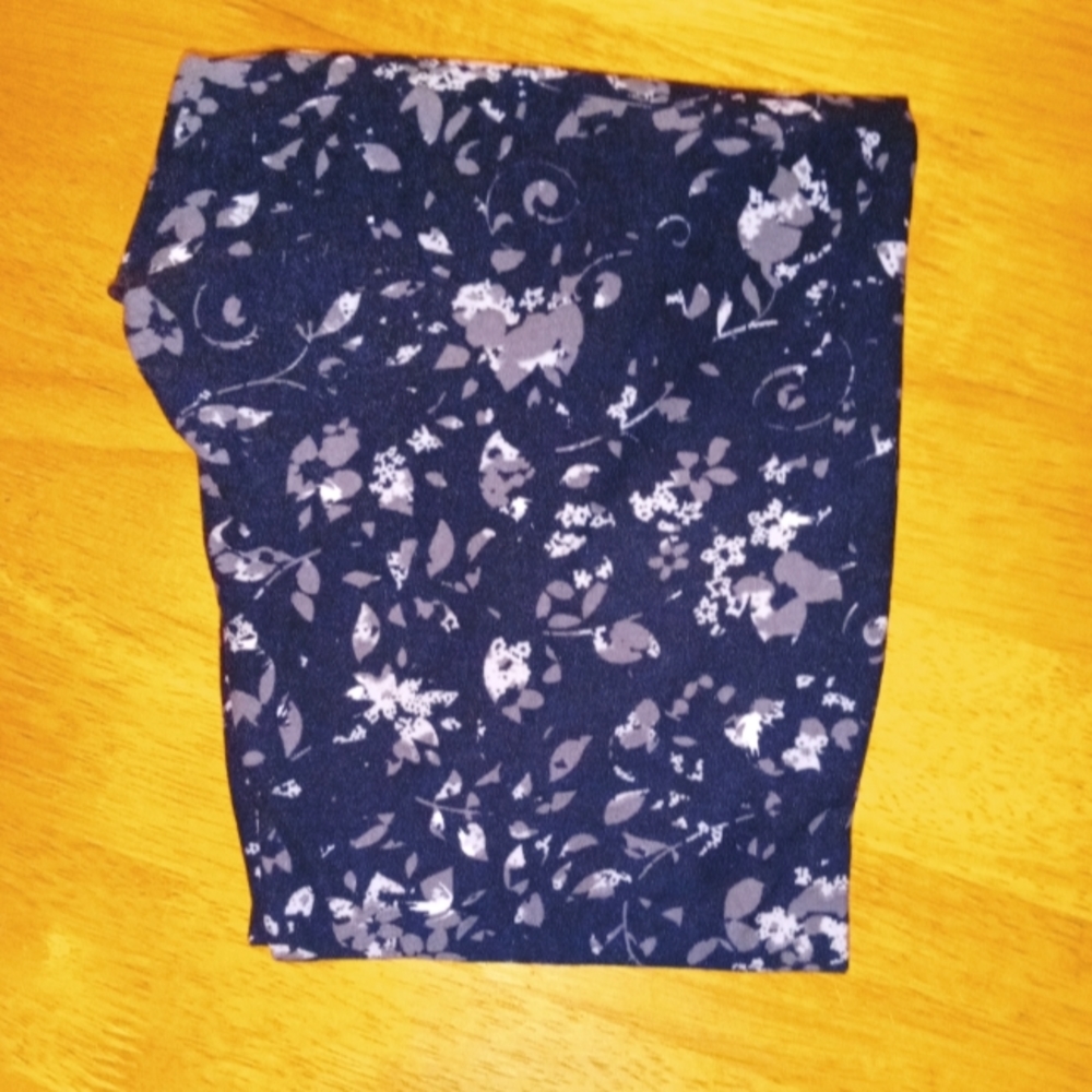 Lularoe, one size, black background with  light grey and dark grey flowers